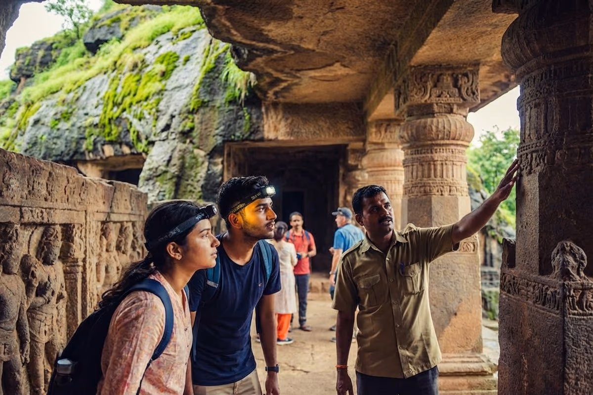Tourists exploring ancient Bhaja Buddhist caves near The Glen Woods Resort