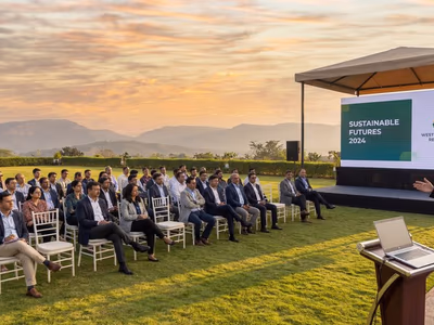 Corporate presentation setup with projector and hill backdrop at The Glen Woods