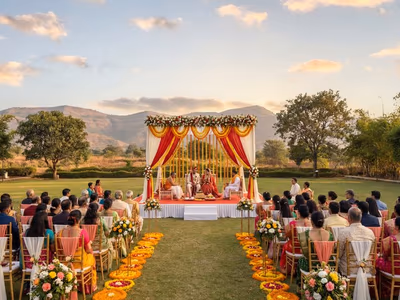 Outdoor wedding ceremony under open sky at The Glen Woods Resort