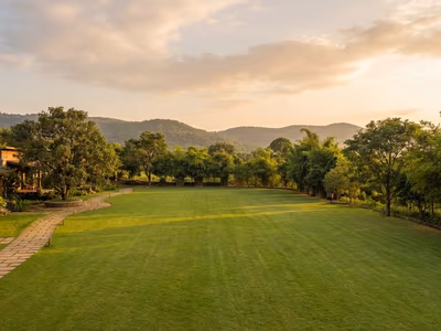 Open lawn wedding venue with hills at The Glen Woods Resort