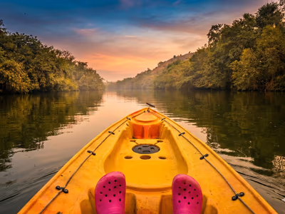 Kayaking on scenic river at The Glen Woods Resort water adventures